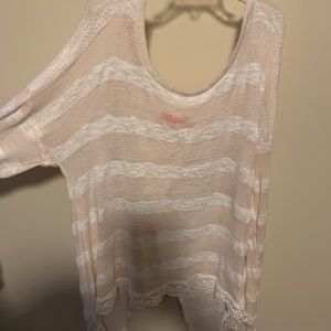 Knitted size medium sweater, open back